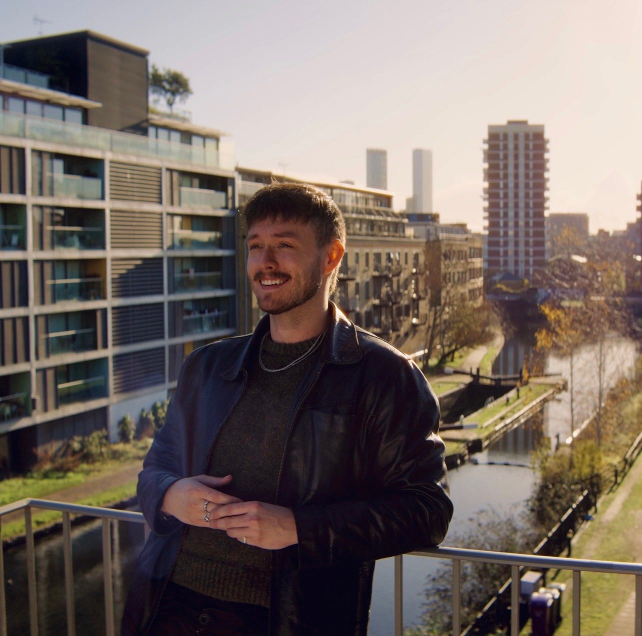 Oliver Durnford, founder of Good Measure, on a terrace overlooking a London canal.